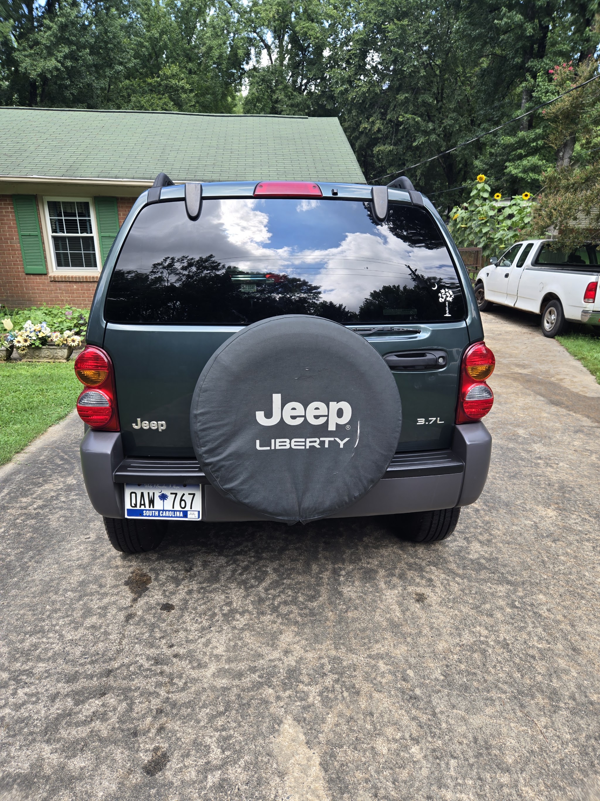 Rear of a Jeep Liberty with clean glass